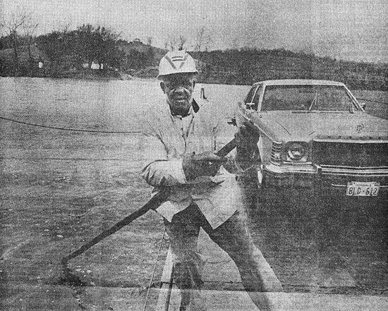 Ned Hocker poling the Hatton Ferry, 08 March 1977